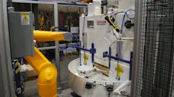 Guyson integrated a robotically automated bead-blast finishing cell that operates unmanned to process fragile automotive components with speed and precision.