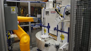 Guyson integrated a robotically automated bead-blast finishing cell that operates unmanned to process fragile automotive components with speed and precision.