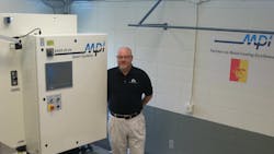 Pittsburg State Universitys Professor Russ Rosmait with the new waxinjection machine donated by MPI Inc and due to be installed this month for the Kansas universitys Manufacturing Engineering Technology Program MPI systems have 5zone temperature control and a hydraulic system for consistent wax flow and pressure Cframe construction and platen heating and cooling among other features Pittsburg State Universitys Professor Russ Rosmait with the new waxinjection machine donated by MPI Inc and due to be installed this month for the Kansas universitys Manufacturing Engineering Technology Program MPI systems have 5zone temperature control and a hydraulic system for consistent wax flow and pressure Cframe construction and platen heating and cooling among other features