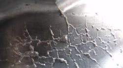 Eliminating water from the die spray lubricant will extend die life by cutting the possibility of die cracking (see above), as well as porosity in the diecastings.