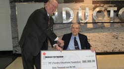 Inductotherm founder Henry M. Rowan presented a check to FEF executive director Bill Sorensen during a banquet honoring the company&rsquo;s long-term employees.