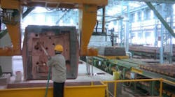 A mold coating process prior to casting. A mold coating process prior to casting.