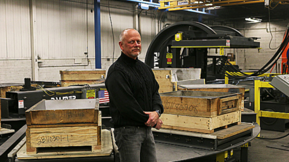 Astech Inc president Alan Bukach showing the new Palmer Manufacturing amp Supply mold carousel