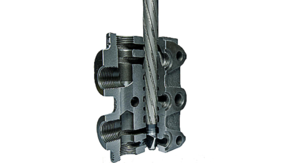 A cutaway view of the Single Stroke Honing process with the tool inside the bore of a cast iron valve body