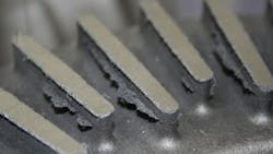 Veining is caused by the expansion of silica sand during casting This photo shows some typical effects of veining on a disc brake casting Veining is caused by the expansion of silica sand during casting This photo shows some typical effects of veining on a disc brake casting