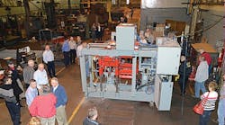 Guests at Hunter Foundry Machinery Corporation&rsquo;s fiftieth-anniversary celebration mingle about the company&rsquo;s latest machine design, the HLM-10 linear motion matchplate molding machine.