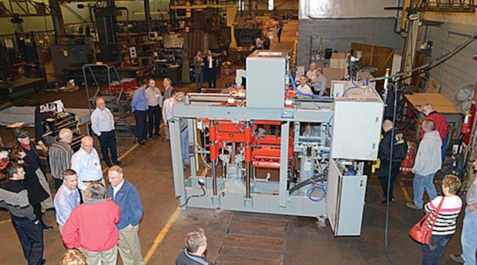 Guests at Hunter Foundry Machinery Corporation&rsquo;s fiftieth-anniversary celebration mingle about the company&rsquo;s latest machine design, the HLM-10 linear motion matchplate molding machine.