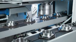 High-volume, high-complexity finishing is supported by integrated automation systems, as shown on this EMAG vertical turning system.