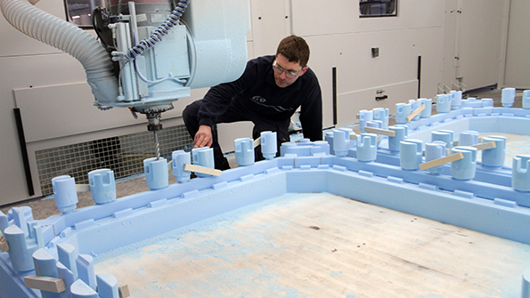 AMRC Castings39 Neil Copley inspects a replica pattern cut from polystyrene on a CMS Industriesrsquo Poseidon fiveaxis machine to cast parts for frames to be used to build civil nuclearwaste storage vessels