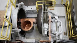 The 1metric ton copper crucible and melting chamber door of AMRC Castings centrifugal casting installation for titanium aerospace engine and structural components The 1metric ton copper crucible and melting chamber door of AMRC Castings centrifugal casting installation for titanium aerospace engine and structural components