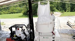 The patent-pending DustAway dust suppression system includes a bulk bag design that attaches to a mixer&rsquo;s opening. For larger machines, Blastcrete offers a custom-sized lid that attaches to the mixer.
