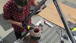 With a portable CMM arm PCMM and laptop on the shop floor parts can be scanned with the data points sent upstream for instant analysis comparison to the CAD file the CAM program comparable machines in the shop producing the same or similar parts and other actions in an information stream With a portable CMM arm PCMM and laptop on the shop floor parts can be scanned with the data points sent upstream for instant analysis comparison to the CAD file the CAM program comparable machines in the shop producing the same or similar parts and other actions in an information stream