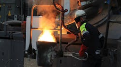 Pouring molten metal at William Cook Cast Products in Sheffield, England.