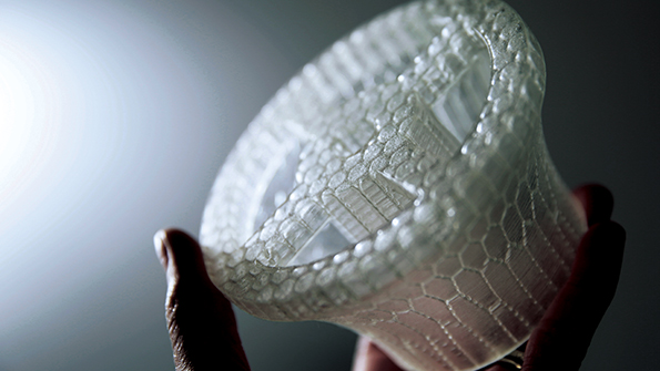 An investment casting mold produced by Stratasys Direct Manufacturing using stereolithography to form a customized polymer formulation rather than wax