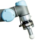 Shown here mounted on a robot arm, the new Axia80 is programmed with two different calibrations that the operator can switch between while the application is running.