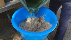 Mixing refractory cement Mixing refractory cement