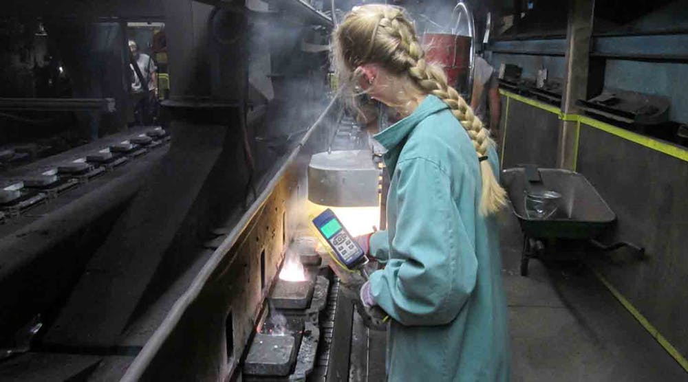 Elizabeth Sturges takes temperature measurements at Ford Meter Box, Wabash, IN.