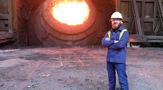 Dr. Szymon Kubal and a basic oxygen furnace at Tata Steel Port Talbot Works, in Wales.