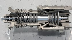 A scaled-down but functional industrial gas turbine produced almost entirely from components &ldquo;printed&rdquo; in aluminum, steel, and titanium alloys.
