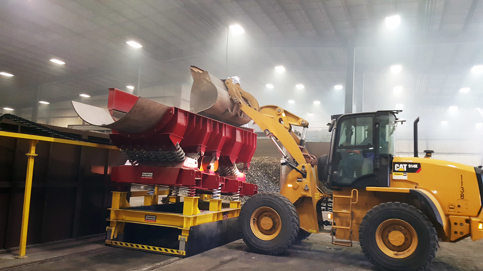 Design features adopted specifically for vibratory furnace charging &mdash; indexing, trough frames, stainless spouts, and controls &mdash; protect workers while withstanding the material impact loads and extreme heat exposure inherent to the process.