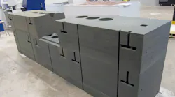 A pre-assembled, 3D-printed sand mold than 100 inches long.