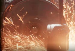 Grinding a cast iron part at Seneca Foundry. Grinding a cast iron part at Seneca Foundry.