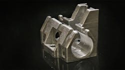 A Ti-6Al-4V bracket for a linear guide, manufactured by gel casting as a demonstrator component. A Ti-6Al-4V bracket for a linear guide, manufactured by gel casting as a demonstrator component.