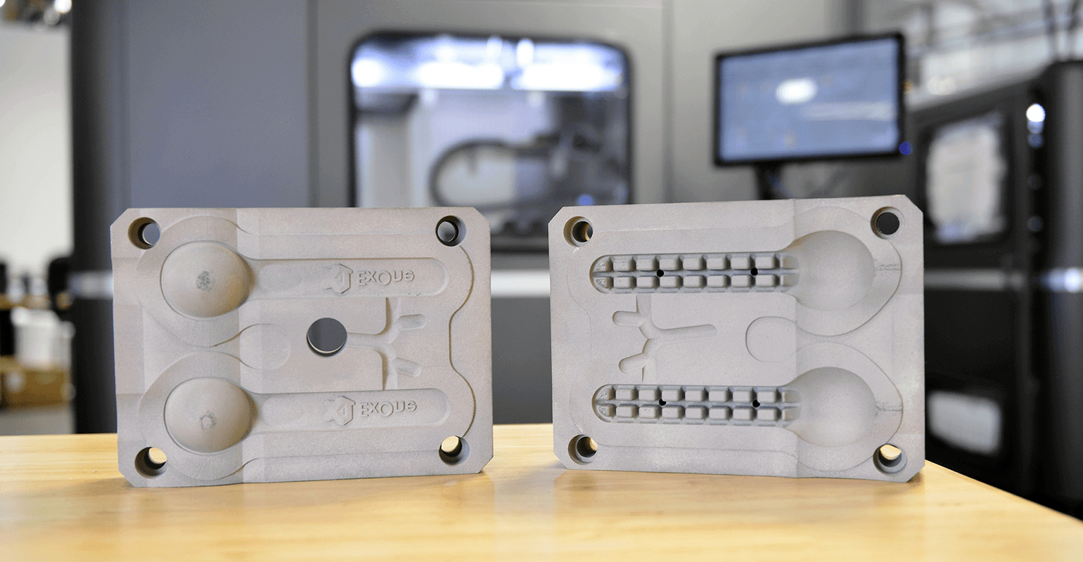 X1 MetalTool is shown for a plastic injection molding application in front of the X1 25Pro&circledR; metal 3D printer.