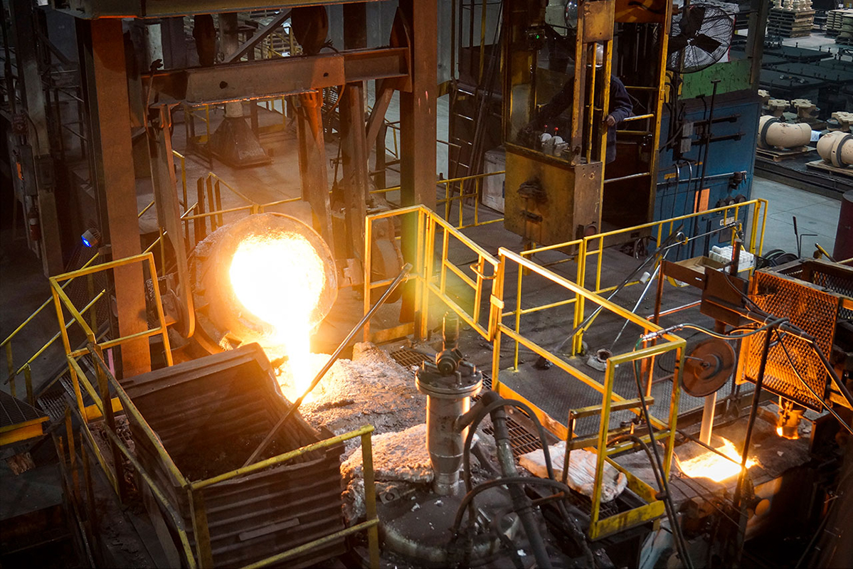 Aarrowcast ladle pouring iron, Shawano, Wisconsin.