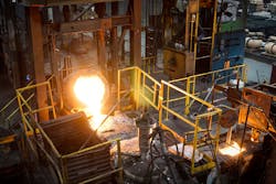 Aarrowcast ladle pouring iron, Shawano, Wisconsin. Aarrowcast ladle pouring iron, Shawano, Wisconsin.