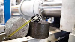 Briquetted metallic residues for furnace charge material. Briquetted metallic residues for furnace charge material.