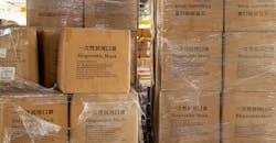 Warehoused packages of face masks. Warehoused packages of face masks.