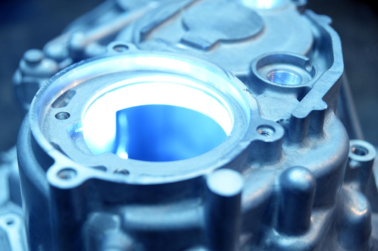 Close-up view of a spectrographic inspection for an aluminum casting.