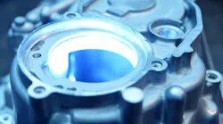 Close-up view of a spectrographic inspection for an aluminum casting.