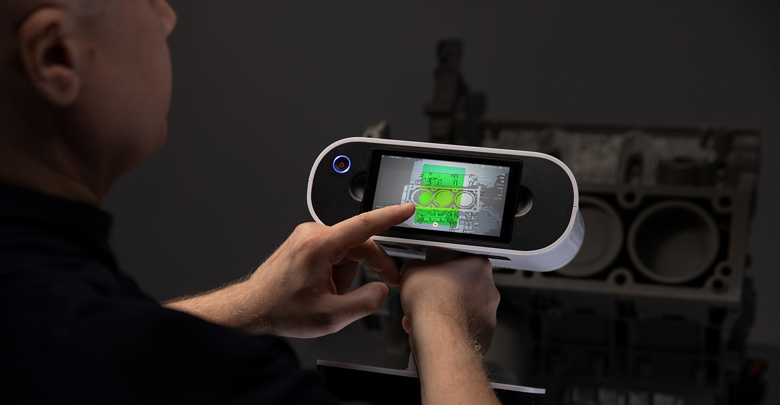 Scanning an automotive engine block with the 2022 Artec Leo 3D scanner.