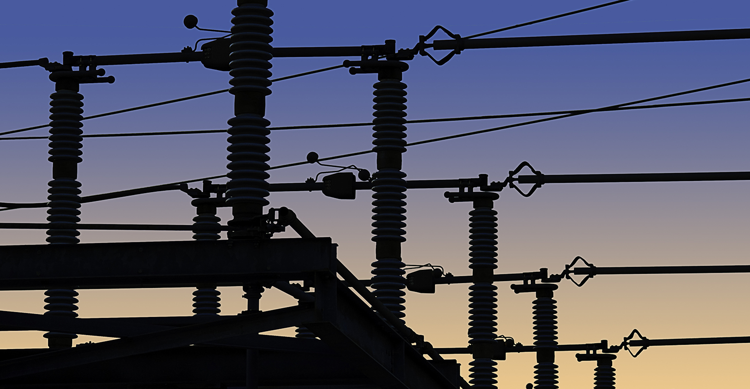 Sunset over power transformers.