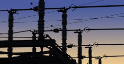 Sunset over power transformers. Sunset over power transformers.