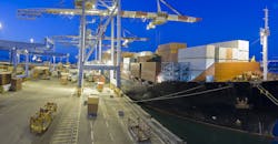 Cargo loading, ship at dockside. Cargo loading, ship at dockside.