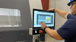 Engineer Kyle Peterson operates an ExOne S-Max Pro at Grede in Iron Mountain, MI. Job box allocations are optimized to fit several hundred cores into a single build.