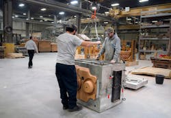Permanent mold assembly at Wisconsin Aluminum Foundry. Permanent mold assembly at Wisconsin Aluminum Foundry.
