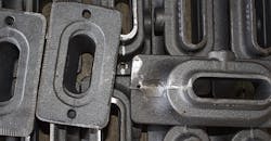 Iron castings are a typical example of the types of discrete manufactured parts that must be conveyed as they cool. Iron castings are a typical example of the types of discrete manufactured parts that must be conveyed as they cool.