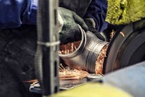 Ferrous valve casting, grinding.