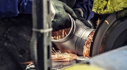 Ferrous valve casting, grinding. Ferrous valve casting, grinding.