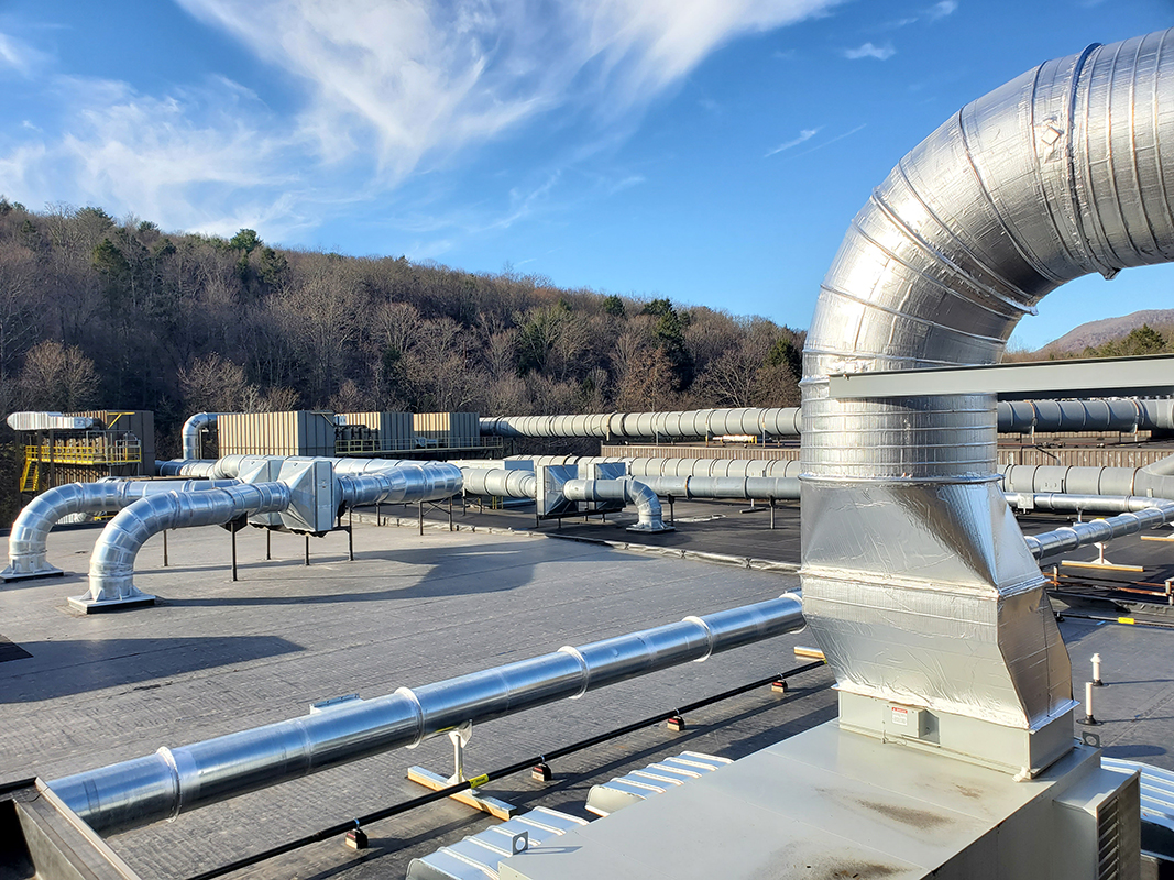 A 300,000-cfm dust-collection system modernization reduces heating costs, maintains a constant airflow, recirculates filtered air, and helps to conserve 1.5 million kWh/year.