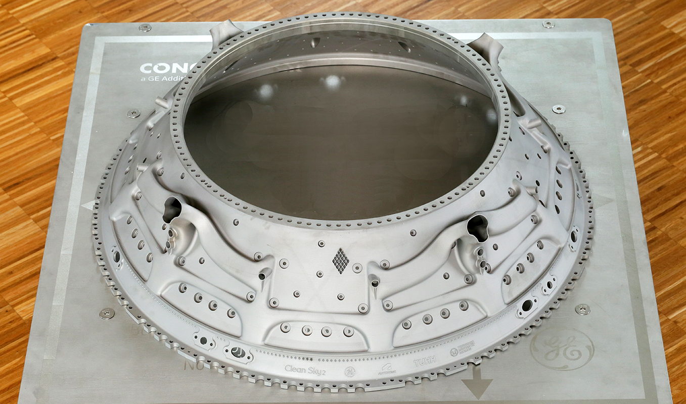 A one-meter diameter turbine center frame (TCF), printed in nickel alloy 718 using GE Additive&rsquo;s direct metal laser melting process, for GE Aerospace.
