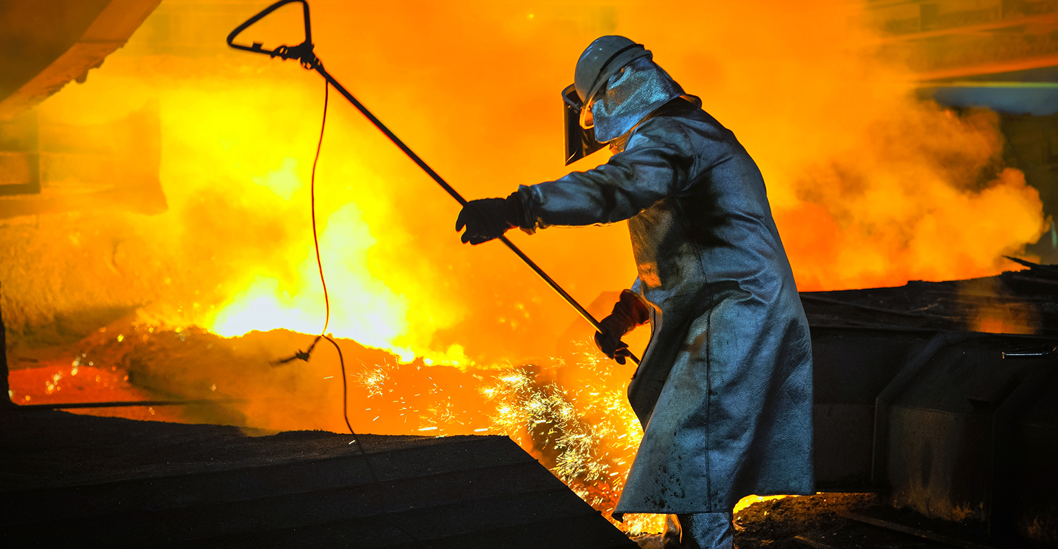 Sampling molten metal.
