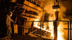 Pouring molten steel from an electric furnace. Pouring molten steel from an electric furnace.