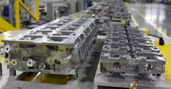 Cast aluminum cylinder heads on a rack at GM Flint Mich. engine plant. Cast aluminum cylinder heads on a rack at GM Flint Mich. engine plant.