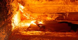 Aluminum melting in a reverberatory furnace. Aluminum melting in a reverberatory furnace.