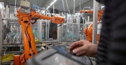 Programming a robot in an automotive manufacturing workcell. Programming a robot in an automotive manufacturing workcell.